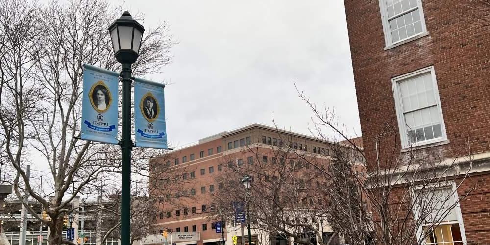 TAKE NOTE: Banners depicting notable women physicians have been installed on the light poles throughout the Weiskotten Hall courtyard as Upstate celebrates 2024 as the 175 anniversary of Elizabeth Blackwell’s graduation from medical school and Upstate becoming the first coed medical school in the country.